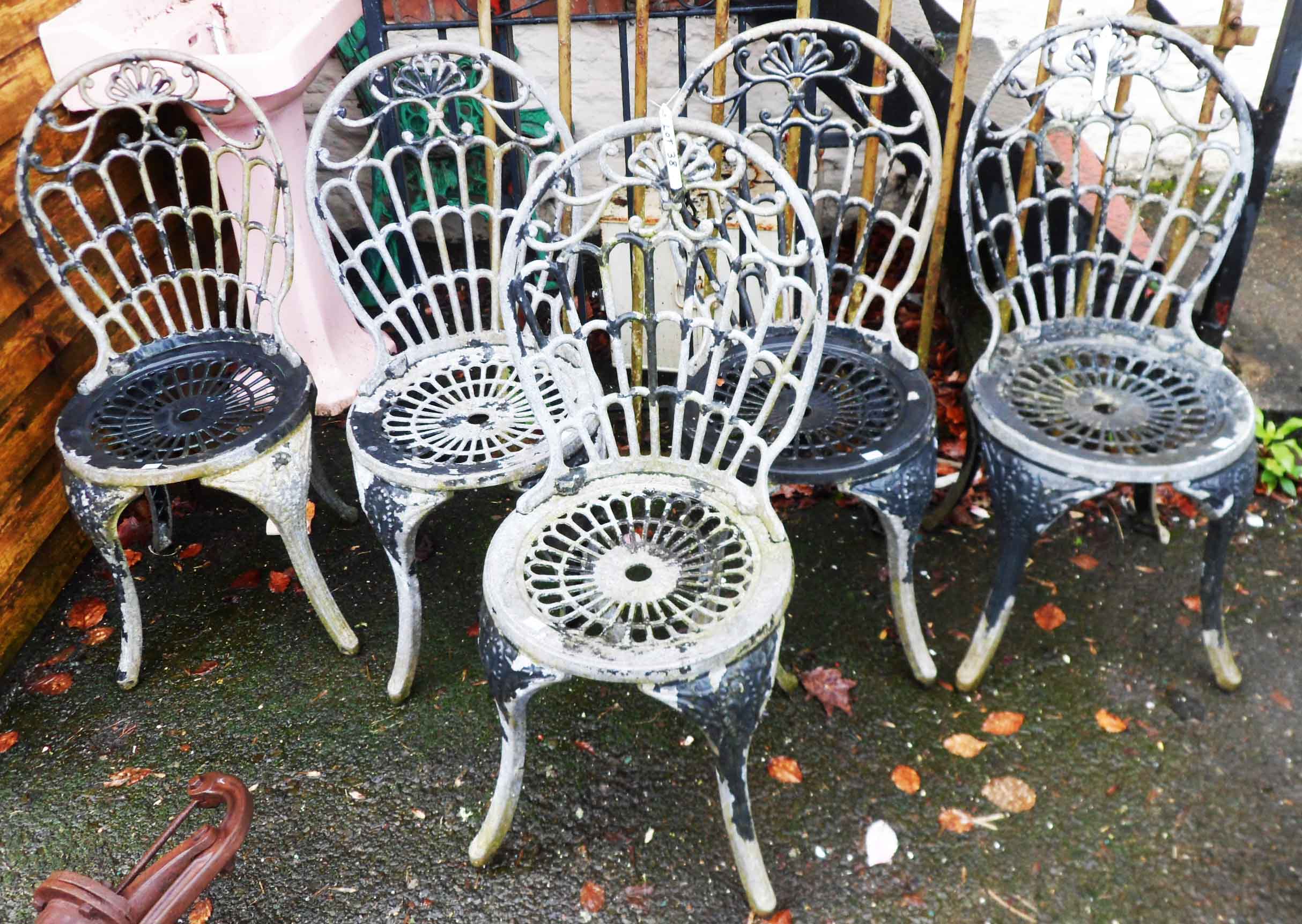 Five matching cast aluminium garden chairs with pierced decoration