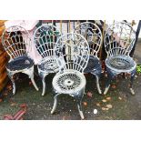 Five matching cast aluminium garden chairs with pierced decoration