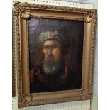 A late 18th Century ornate gilt framed oil on canvas portrait of a bearded gentleman wearing a