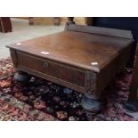 A pair of 22" 19th Century walnut low bedside single drawer units, set on turned front legs -