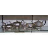 A mid 20th Century three piece silver plated tea set - sold with another