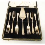 A cased set of six silver cake forks and server