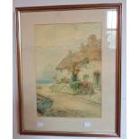 Louis Mortimer: a framed watercolour, depicting coastal thatched cottages - signed - light