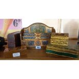 A wooden letter rack with painted and gilt decoration - sold with a leather covered photograph