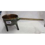 An antique cast brass posnet pot