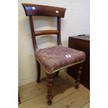 A Victorian mahogany framed child's standard chair with wide curved back rail and upholstered