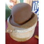 A vintage boxed lady's brown riding bowler hat, by Mrs White of Burlington Gardens