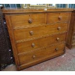 A 4' Victorian walnut chest of two short and three long graduated drawers set on rounded plinth base