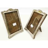 A pair of silver fronted photograph frames with polished wood easel backs - to take 5 1/2" X 3 1/2"
