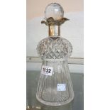 An early 20th Century cut glass thistle shaped decanter with silver collar, hallmarked for John