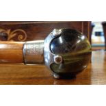 A late Victorian malacca walking cane with tiger's-eye ball knop set on silver coronet mount -