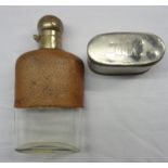 A vintage Glenkinchie promotional hip flask, with flip-top and cup base
