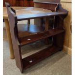 A 24" late Victorian mahogany wall mounted three shelf unit