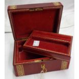 A leather clad jewellery box with velvet lining - with key