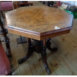 A 28 1/2" Victorian inlaid walnut occasional table with octagonal top, set on quadruple turned