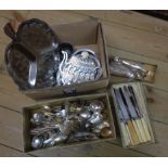 A box containing a quantity of assorted silver plated and other cutlery, teapot stand, etc.