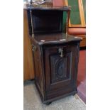 A 13 1/2" Edwardian walnut and brassed metal mounted coal perdonium with spindle gallery and shelf