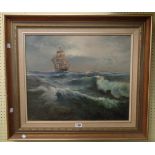 W. M. Bennett: a gilt framed oil on board, depicting a sailing ship on stormy seas - signed - 19 1/