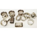 Seven English silver napkin rings - sold with a set of six white metal similar with nielo Nile scene