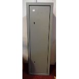 A grey painted metal Brattonsound gun cabinet with two sets of keys