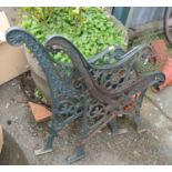 A pair of cast iron bench ends