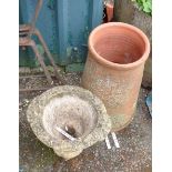 A small concrete urn - sold with a terracotta chimney pot