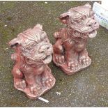 A pair of concrete stylised dog-o-fo with red gilt finish - height 20"