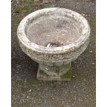 A cast concrete pedestal garden planter - diameter 17 1/2"