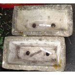 A pair of 17" concrete troughs