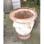 A 19th Century cast iron garden urn with swag decoration, set on socle base - full height 21 3/4"