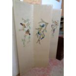 A 20th Century four-fold dressing screen with embroidered perching bird decoration