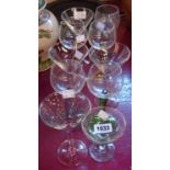 A small quantity of glasses with coloured stems - sold with a Babycham glass
