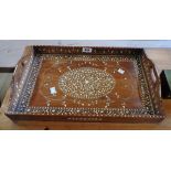 An 18" Anglo Indian Raj period ivory inlaid hardwood serving tray with profuse foliate scroll and