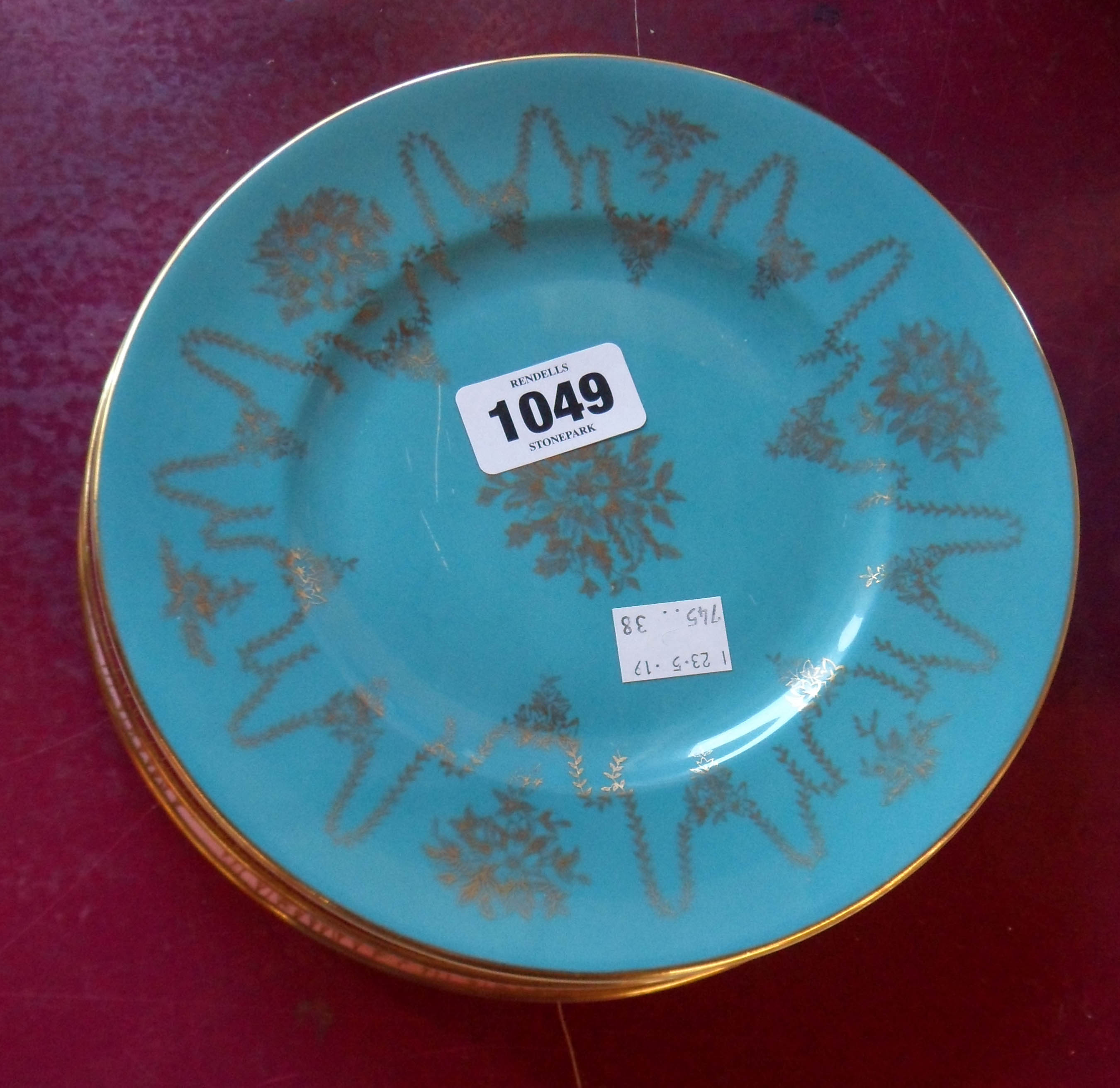 Six Coalport plates with gilt decoration, comprising three Sincerity pattern