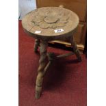 An antique bleached carved wood milking style stool with barley twist supports - sold with a stained