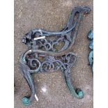 A pair of cast iron bench ends