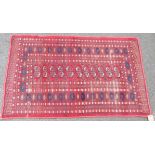 A small Bokhara rug - 4' 11" X 36" (150cm X 91cm) - worn