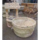 A small concrete garden wishing well - sold with a planter