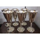 A set of six silver plated wine goblets by Alfonso Lara with decorative stems