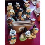 A set of twelve Franklin Wood & Sons ceramic Dickens figure jugs with cards