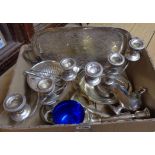 A box containing a quantity of silver plated items including pair of three branch candelabra,