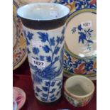 An oriental blue and white cylindrical vase - sold with a small Cantonese bowl