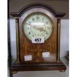 An Edwardian inlaid mahogany break dome top mantel timepiece with decorative dial and eight day