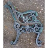 A pair of cast iron bench ends