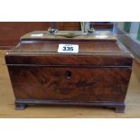 A 10" 19th Century figured mahogany tea caddy carcass with large brass handle to lid and remains