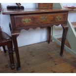 A 32" antique polished oak lowboy with frieze drawer and shaped apron, set on cabriole legs