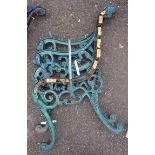 A pair of cast iron bench ends