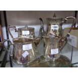 A late Victorian silver plated four piece tea and coffee set with engraved decoration and cast