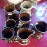 Six Jeremy Leach mugs of various size - sold with a jug