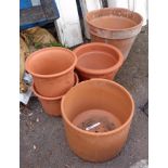 Five large terracotta pots - two with external frost damage